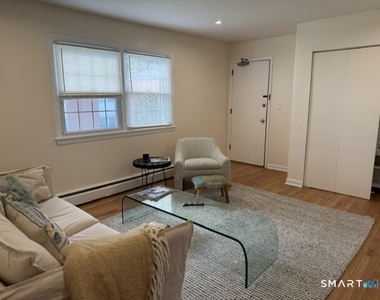 949 Hopmeadow Street - Photo Thumbnail 1