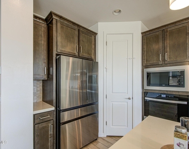 11341 E Ulysses Avenue - Photo Thumbnail 8
