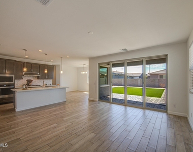 11341 E Ulysses Avenue - Photo Thumbnail 2