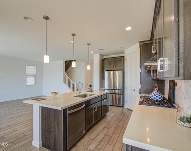 11341 E Ulysses Avenue - Photo Thumbnail 5