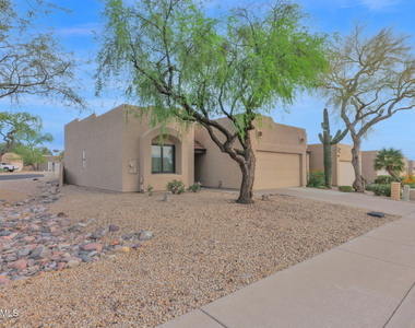 10923 N 117th Place - Photo Thumbnail 2