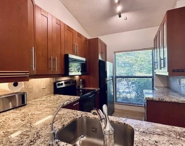 3054 S Oakland Forest Drive - Photo Thumbnail 3