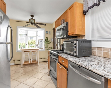 52 Syracuse Street - Photo Thumbnail 7