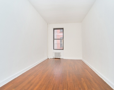 353 W 44th Street - Photo Thumbnail 2