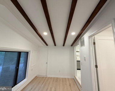 6048 Ramshorn Place - Photo Thumbnail 4