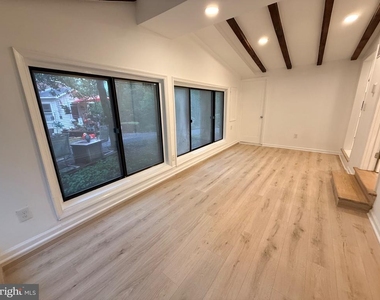6048 Ramshorn Place - Photo Thumbnail 2