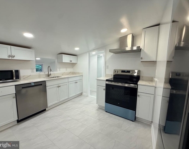 6048 Ramshorn Place - Photo Thumbnail 13
