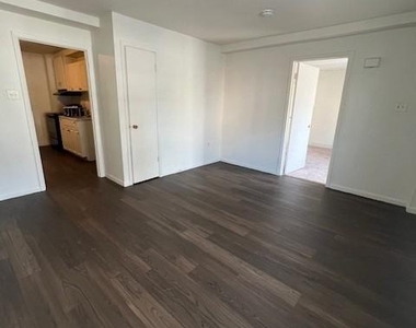 100 E 6th Street - Photo Thumbnail 4