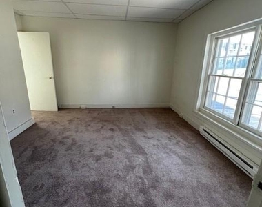 100 E 6th Street - Photo Thumbnail 5