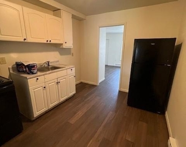 100 E 6th Street - Photo Thumbnail 2