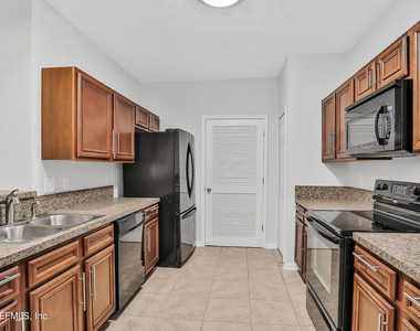8241 Pelican Landing Road - Photo Thumbnail 9