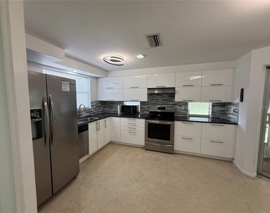8735 Dunmore Drive - Photo Thumbnail 6