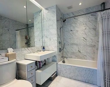 15 West 61st Street - Photo Thumbnail 2
