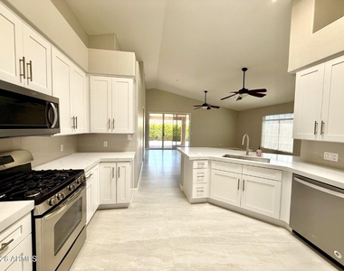 11815 E Clinton Street - Photo Thumbnail 3