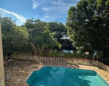 4265 Nw Tamiami Canal Dr - Photo Thumbnail 1