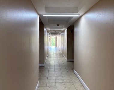 4265 Nw Tamiami Canal Dr - Photo Thumbnail 2