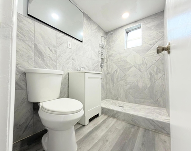 131 E 27th Street - Photo Thumbnail 2