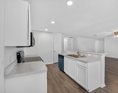 9605 Woodrow Wilson Drive - Photo Thumbnail 2