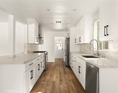 5840 Allott Avenue - Photo Thumbnail 5