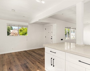 5840 Allott Avenue - Photo Thumbnail 4