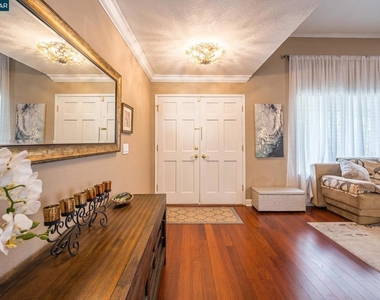 1304 Saddlehill Ln - Photo Thumbnail 4