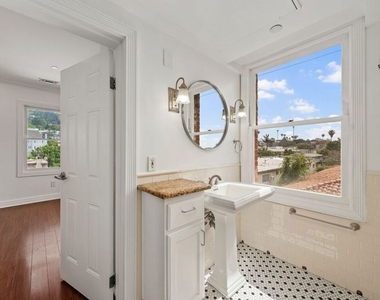 1236 N Flores Street - Photo Thumbnail 1