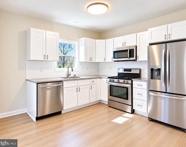 103 Logan Lane - Photo Thumbnail 1