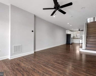 539 W 27th Street W - Photo Thumbnail 4