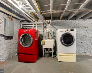 539 W 27th Street W - Photo Thumbnail 26