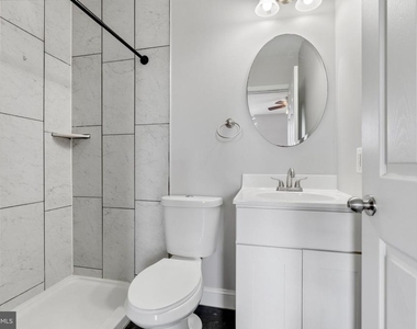 539 W 27th Street W - Photo Thumbnail 16