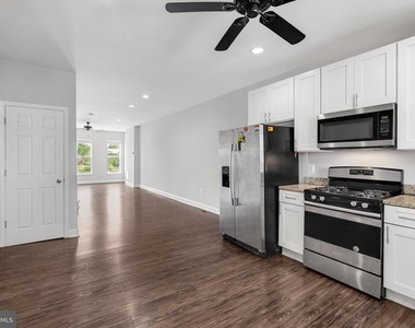 539 W 27th Street W - Photo Thumbnail 10