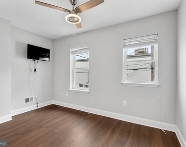 539 W 27th Street W - Photo Thumbnail 18