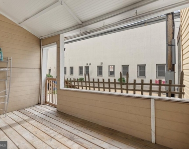 539 W 27th Street W - Photo Thumbnail 27