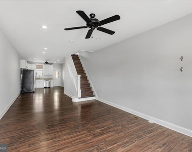 539 W 27th Street W - Photo Thumbnail 5