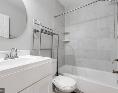 539 W 27th Street W - Photo Thumbnail 20