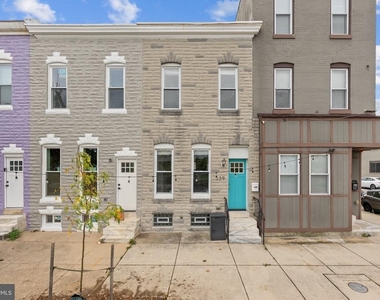 539 W 27th Street W - Photo Thumbnail 1