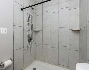 539 W 27th Street W - Photo Thumbnail 17