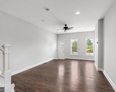 539 W 27th Street W - Photo Thumbnail 3