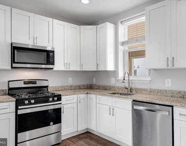 539 W 27th Street W - Photo Thumbnail 9