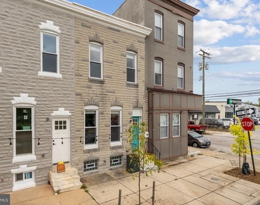 539 W 27th Street W - Photo Thumbnail 2
