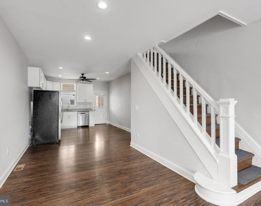 539 W 27th Street W - Photo Thumbnail 6
