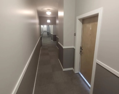 1228 W Monroe Street - Photo Thumbnail 2