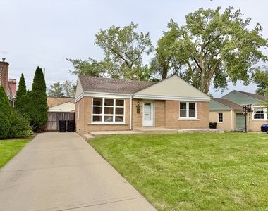 5816 W Greenleaf Avenue - Photo Thumbnail 1