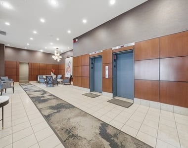 233 E Erie Street - Photo Thumbnail 2