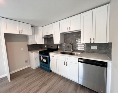 6708 Avenue I - Photo Thumbnail 2