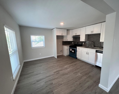 6708 Avenue I - Photo Thumbnail 3