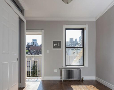 East 5 Street - Photo Thumbnail 3