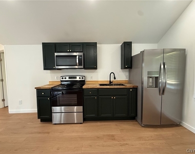 7409 Collamer Road - Photo Thumbnail 4