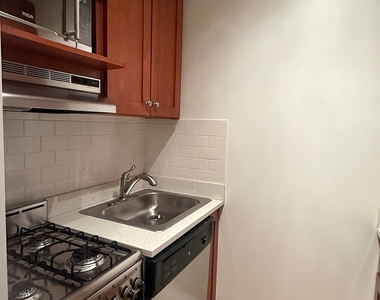 East 83 Street - Photo Thumbnail 2