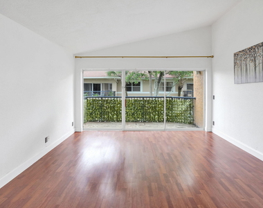 8761 Wiles Road - Photo Thumbnail 4